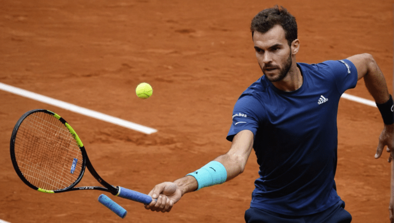 adrian mannarino subit une défaite dès le premier tour face à félix auger-aliassime lors du tournoi de madrid. découvrez les détails de ce match intense et les réactions des joueurs.